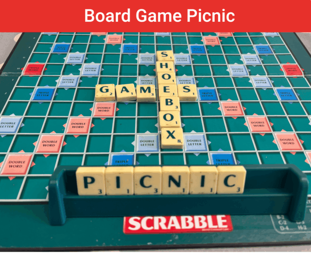scrable board with the words shoebox and games with picnic on the players board.